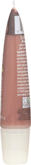 Burt's Bees tube beside coin showing size and travel-friendly convenience
