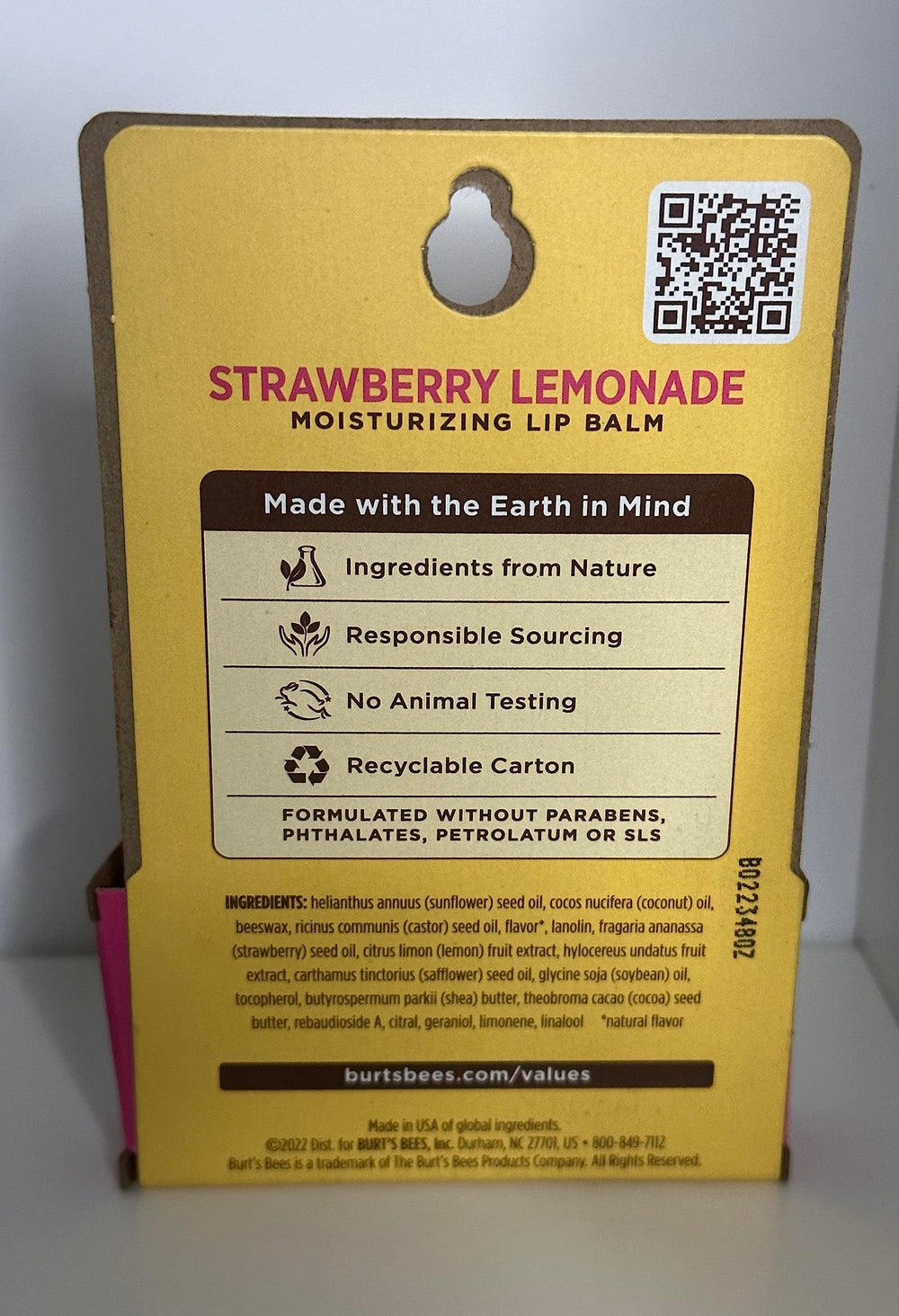 Burt's Bees close-up label showing ingredients and clean formulation benefits