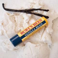 Burt's Bees balm applied to lips showing matte finish and smooth texture benefit