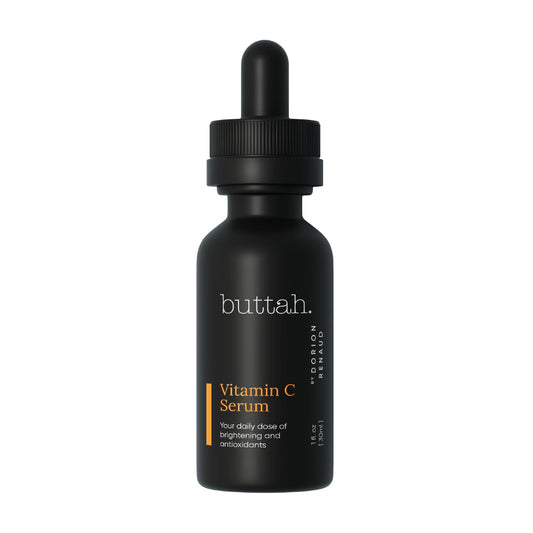 buttah. front bottle view showing brightening serum benefits