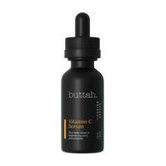 buttah. front bottle view showing brightening serum benefits
