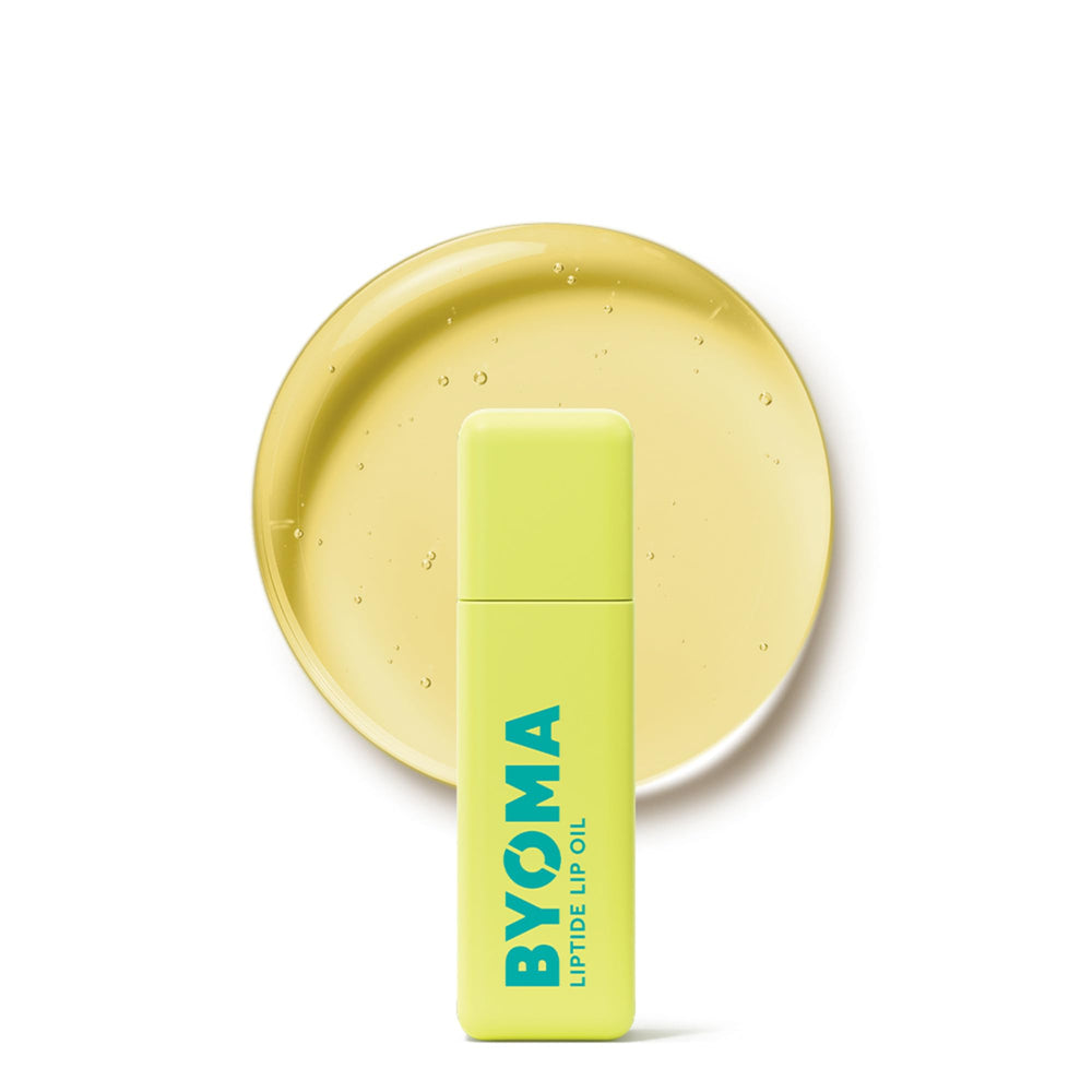 BYOMA lip oil front tube showing compact glossy packaging and travel convenience