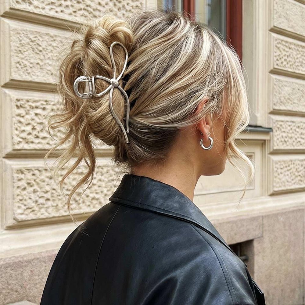 CAKURE bow clips pair on flatlay showing matching styling options