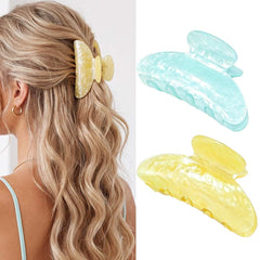 CAKURE front view of two pastel clips showing colors and shape for versatile styling
