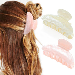 CAKURE front view of pink and e-beige claw clips showing color contrast and polished finish