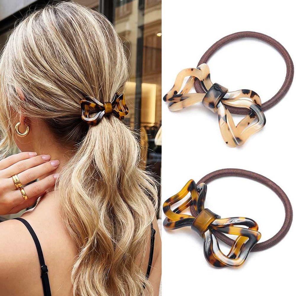 CAKURE front view of tortoise shell bow hair ties showing elegant design and secure hold