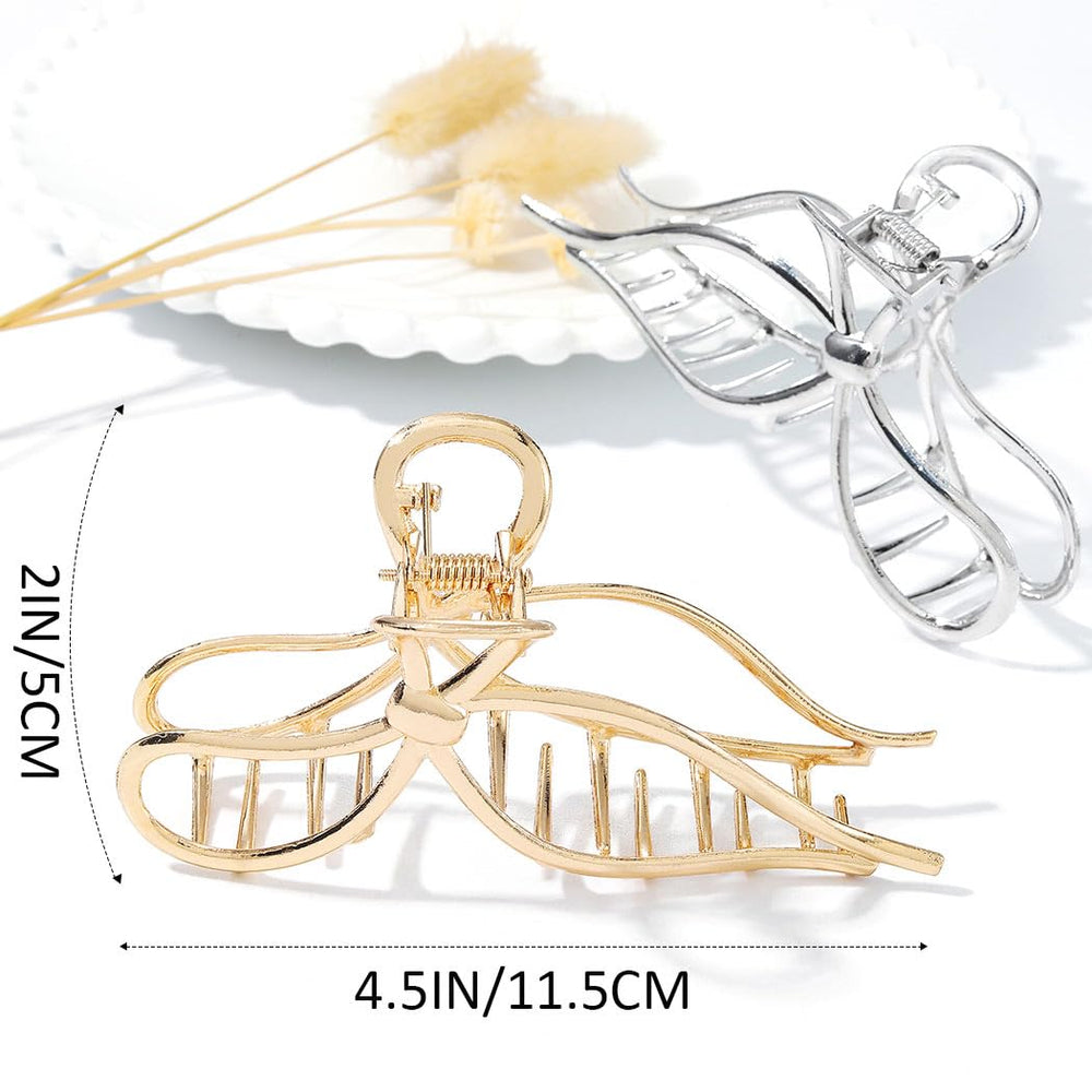 CAKURE gold bow clip side profile highlighting metal finish and spring