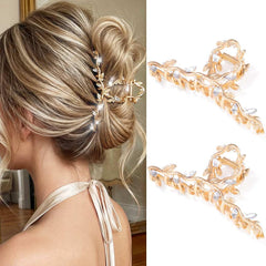 CAKURE gold claw clip front view showing leaf design and elegant sparkle