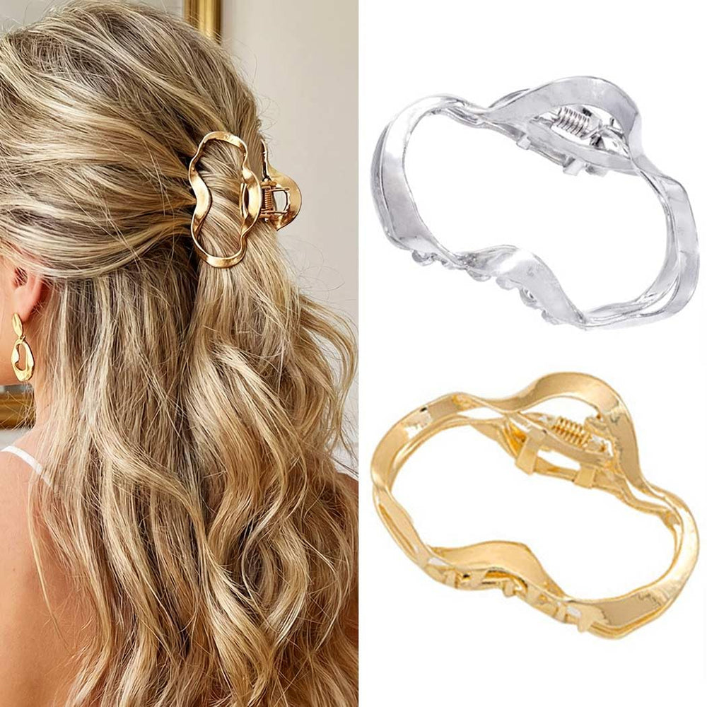 CAKURE gold claw clip front view showing polished finish and secure hold