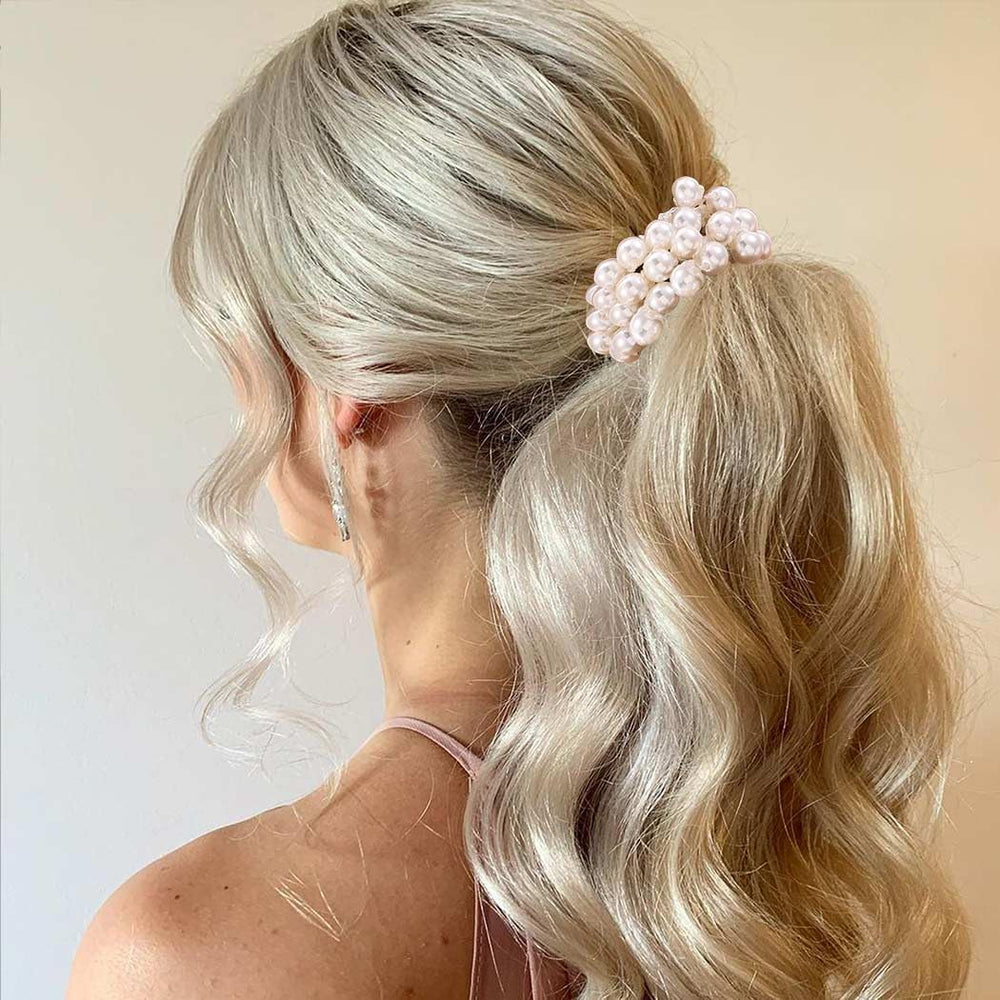 CAKURE scrunchie wrapped around braid adding decorative charm to braided styles