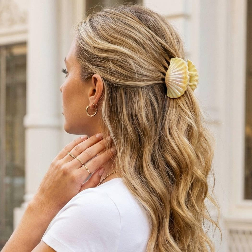 CAKURE clips worn in half-up hairstyle demonstrating secure grip and mermaid-inspired sparkle