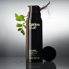Caldera + Lab shampoo foam texture close-up demonstrating mild lather benefit