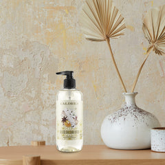 Caldrea pump in use washing hands for soft conditioned skin