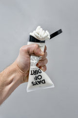 California Born tube on bathroom shelf conveying travel-friendly, everyday use