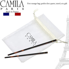 Camila Paris two pins securing a neat chignon for dependable hold
