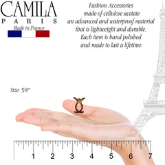Camila Paris clips in hand for scale showing compact size and practical hold