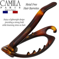 Camila Paris securing a full updo for stable, comfortable styling