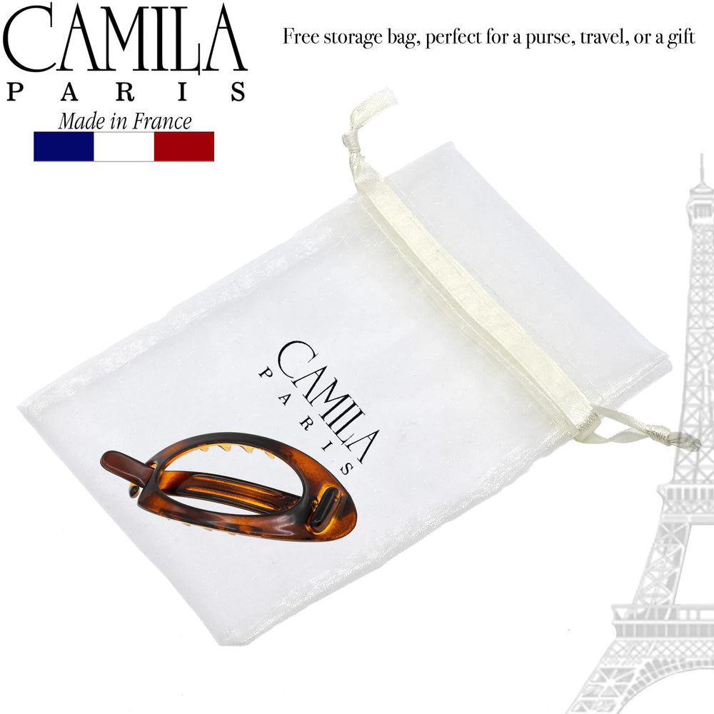 Camila Paris beside a hand for scale to show true 3.5-inch size