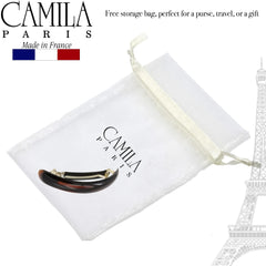 Camila Paris next to a hand for scale showing compact 3.5-inch size and comfort