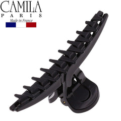 Camila Paris clipped in half-up style for quick everyday elegance