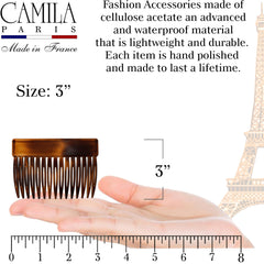 Camila Paris comb held in hand demonstrating 3-inch size and lightweight feel