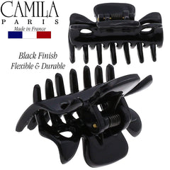 Camila Paris clip next to fingers to show 1.5-inch scale and travel-ready size