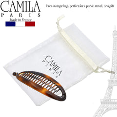 Camila secured in a French twist hairstyle for a polished updo