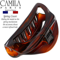 Camila Paris clip holding a bun for quick polished styling