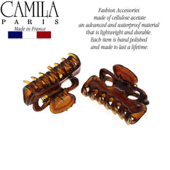 Camila Paris held in hand to show compact scale and travel-friendly convenience