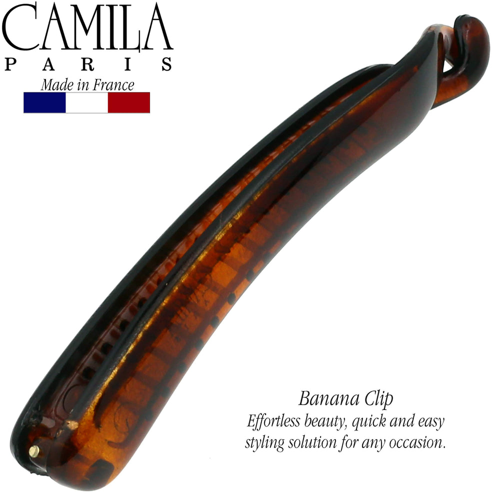 Camila Paris NV133 holding thick hair demonstrating reliable all-day support