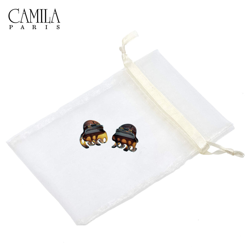 Camila Paris acetate texture and shine close-up showing smooth edges that protect hair benefit