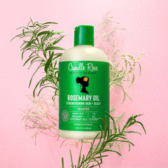 Camille Rose shampoo being massaged into wet hair for cleaner scalp
