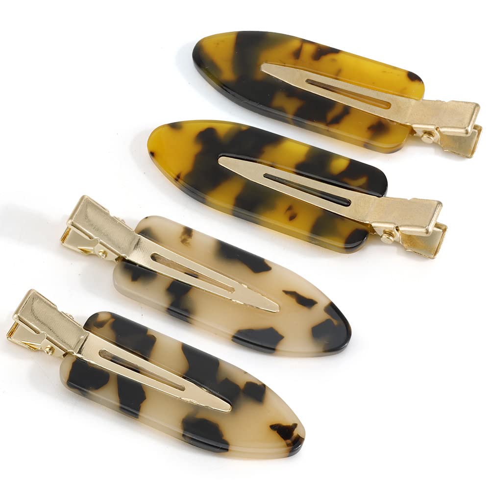 Canitor front view of tortoise-shell clips showing polished finish and secure hold