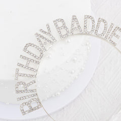 Canitor model wearing tiara in party setting creates photo-ready look