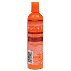 Open jar texture of Cantu cream highlighting smooth moisturizing texture