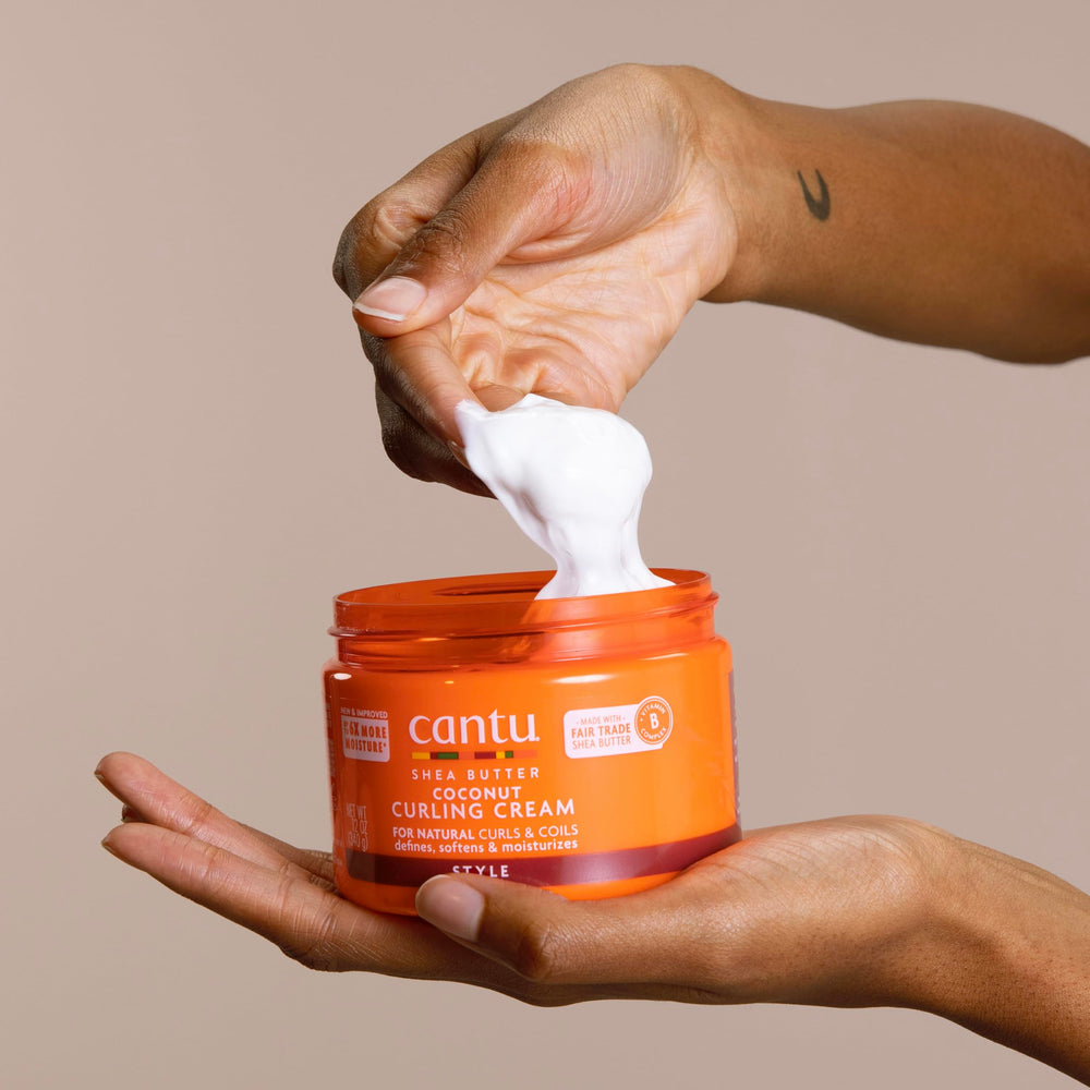 Label close-up on Cantu jar showing ingredient claims and cruelty-free benefit