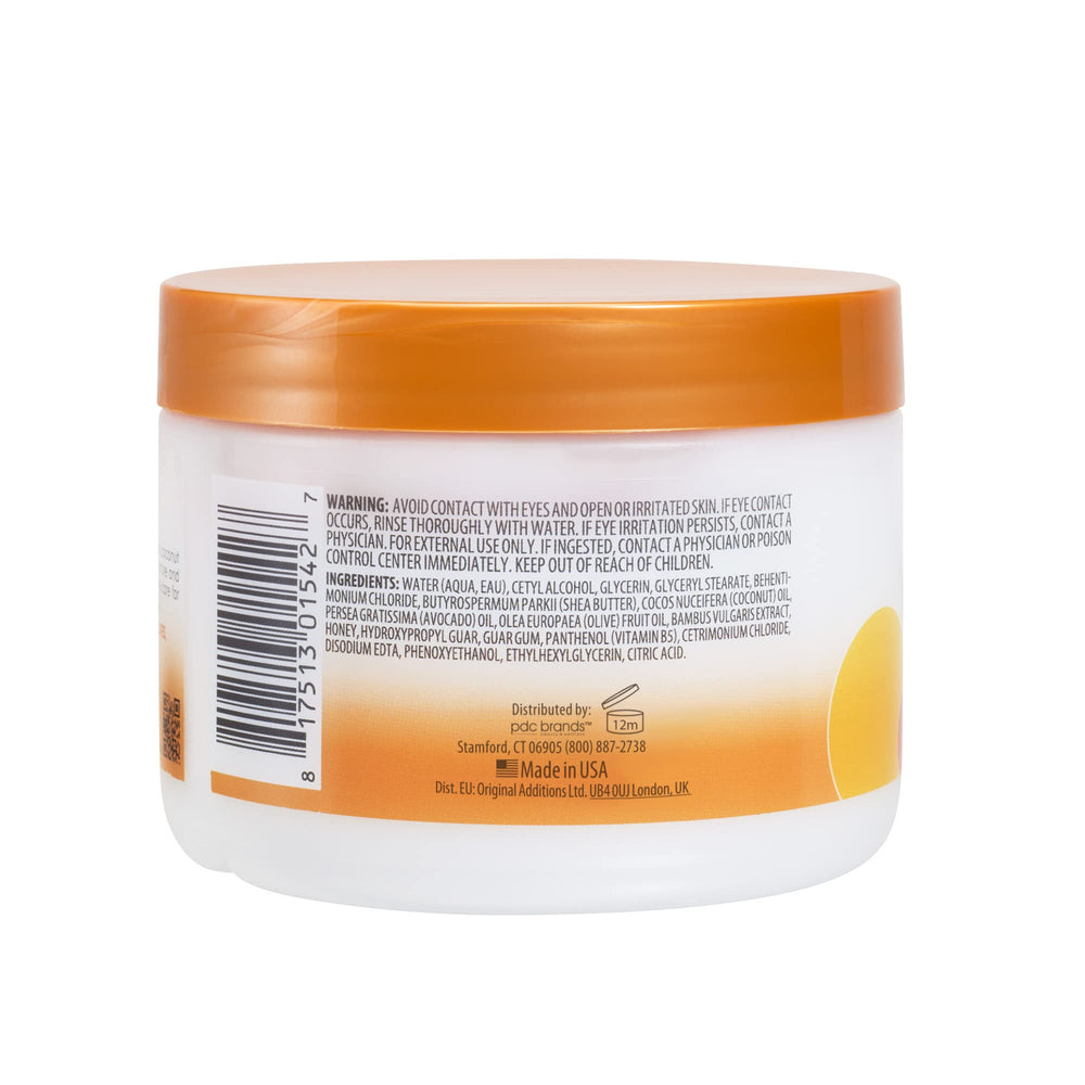 Cantu leave-in conditioner on bathroom shelf staged for everyday styling convenience