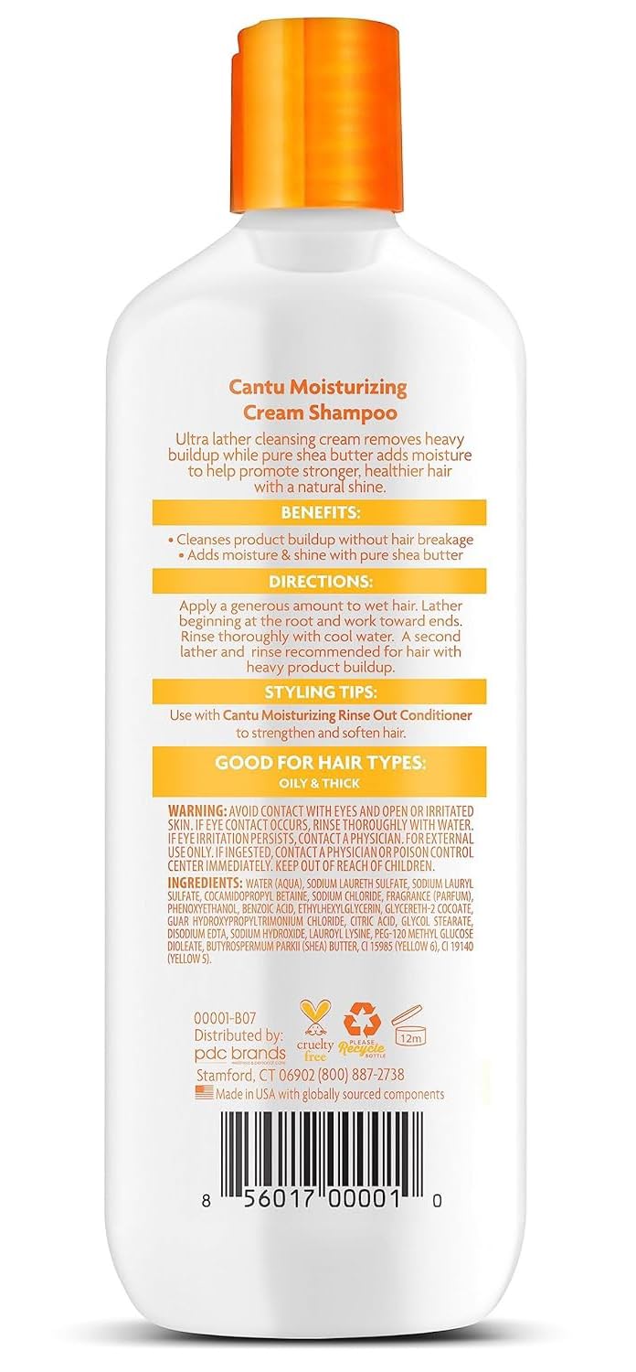 Cantu shampoo lather on palm showing cleansing foam and gentle hydration