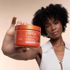Cantu with Jamaican Black Castor Oil visual showing fortifying oil for stronger hair