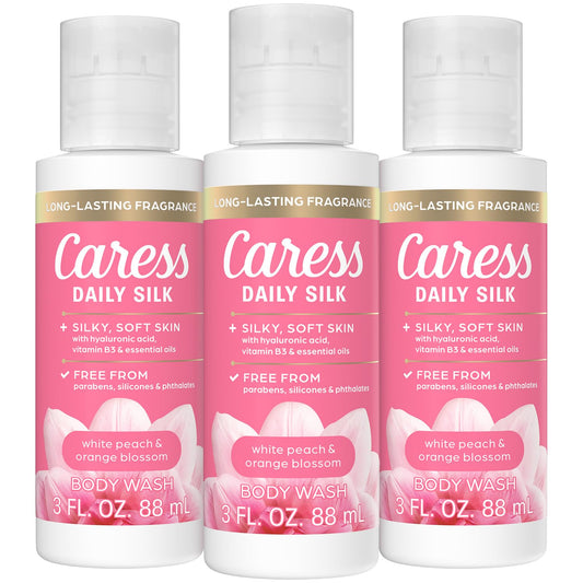 Caress front packaging showing bottle and vibrant label, evokes uplifting scent