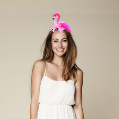 CARMELIT flamingo styled with costume shows versatile styling and playful costume enhancement