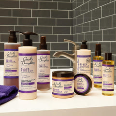 Carol's Daughter lifestyle shot on vanity evoking founder-made, natural-care benefit