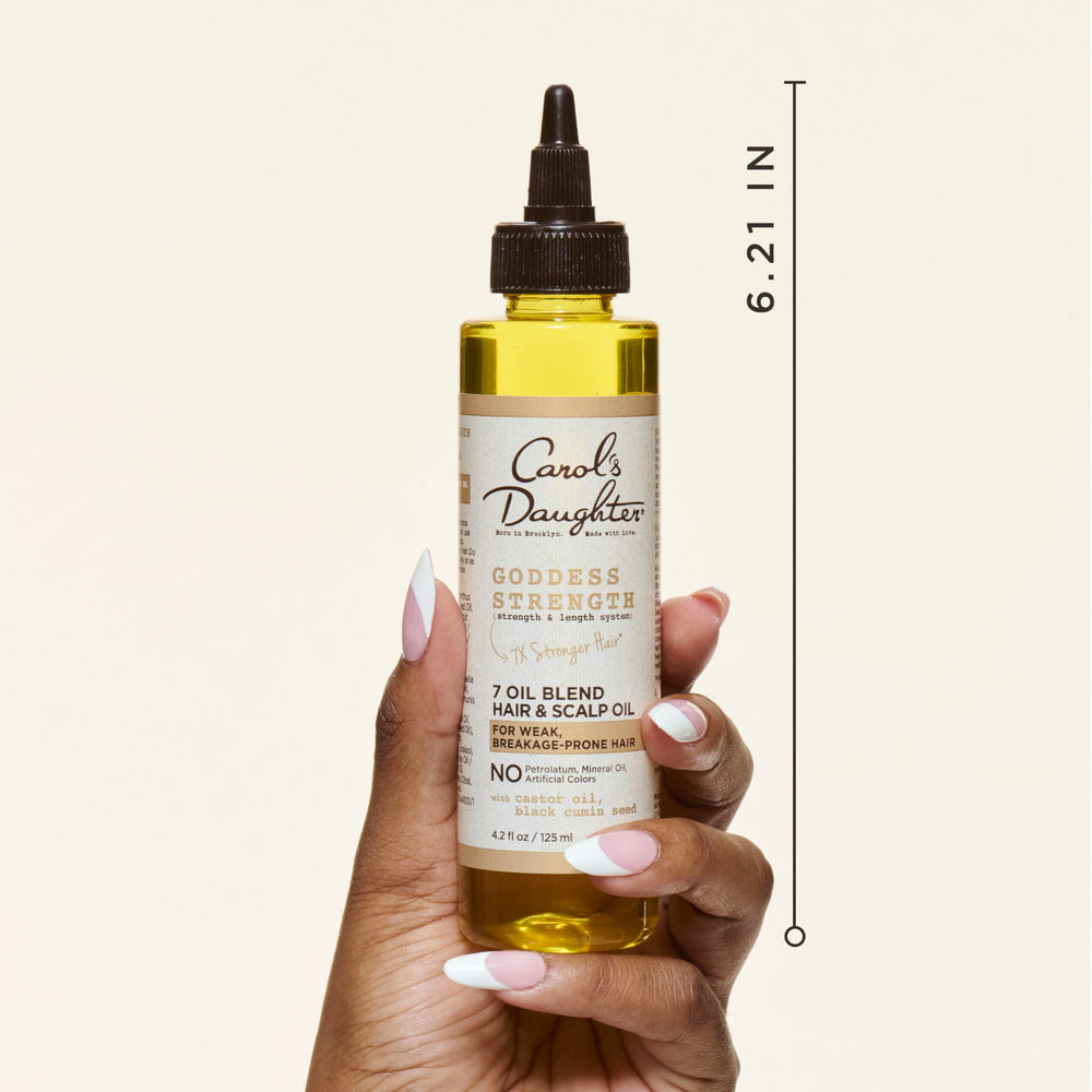 Carol's Daughter applicator tip close-up for precise scalp placement