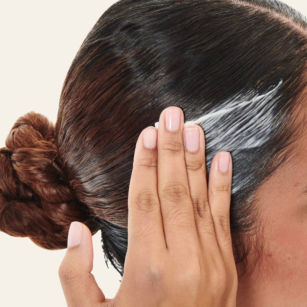 Carol's Daughter ingredients shot highlighting castor oil benefits for strength