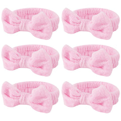 Casoty front view of six pink headbands showing neat packaging and appeal