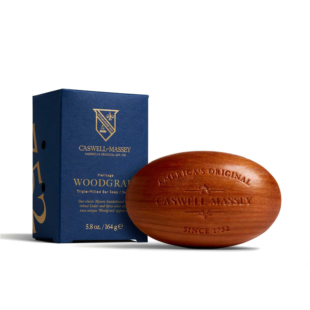 Caswell-Massey front packaging showing woodgrain design and premium scent benefit