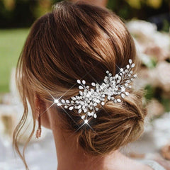 Catery comb held in hand showing size and scale benefit: easy to position securely
