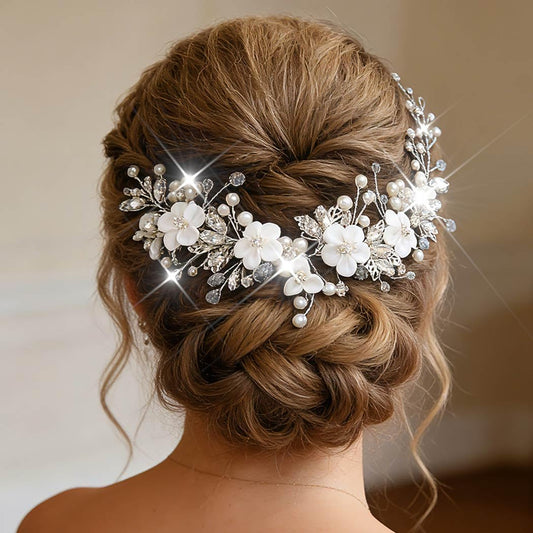 Catery front view of silver flower headpiece showing full design and balance