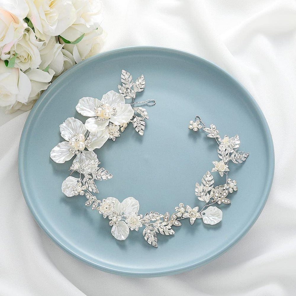 Catery headband styled with veil in soft bridal setting for layered elegance