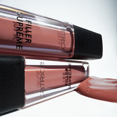 Catrice gloss on lips Nude Not Rude giving hydrated, luminous finish